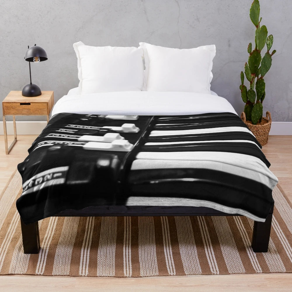 Closeup of a realistic Hammond B3 organ-inspired plush blanket