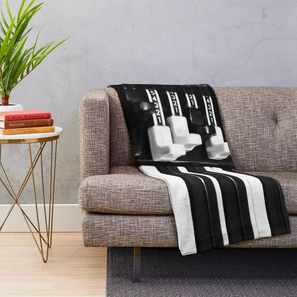Closeup of a realistic Hammond B3 organ-inspired plush blanket