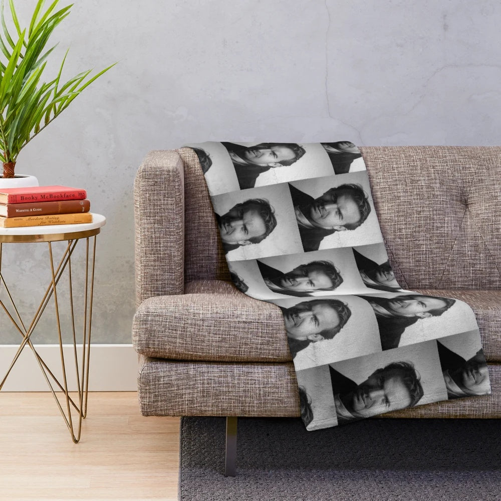 Realistic portrait of actor Kevin Costner on a plush blanket