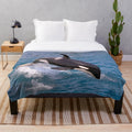 Plush blanket with realistic killer whale or orca jumping design