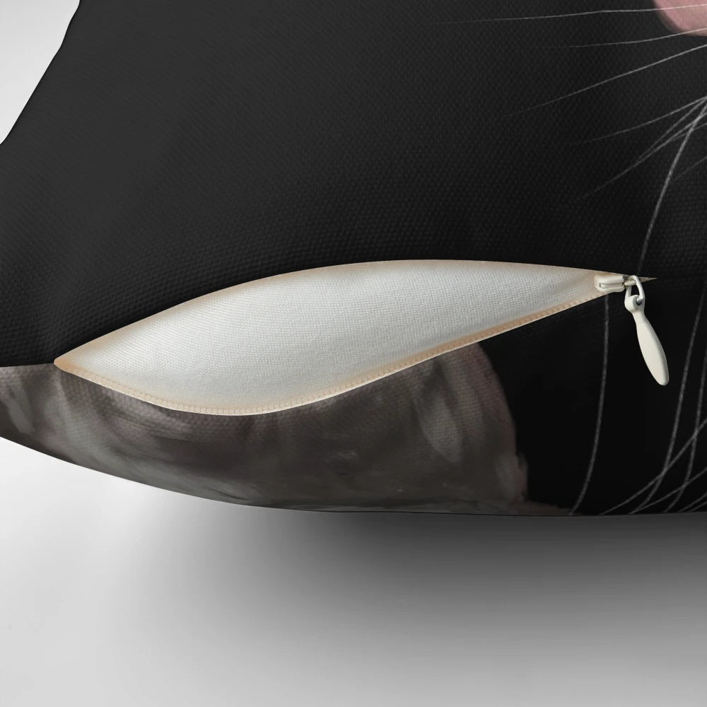 Detailed illustration of a grey and black Dumbo Rat on a decorative pillow.