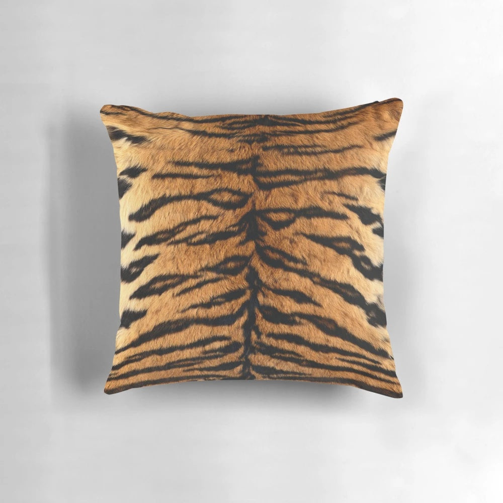 Closeup of a realistic tiger print decorative pillow with an orange and black striped pattern
