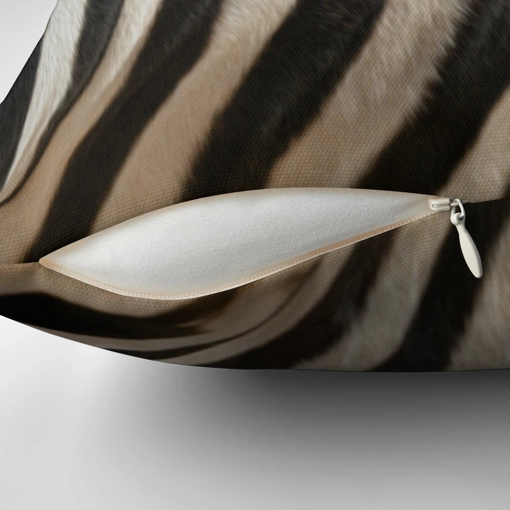 Close-up image of a realistic zebra patterned pillow, showcasing the intricate black and white stripes.