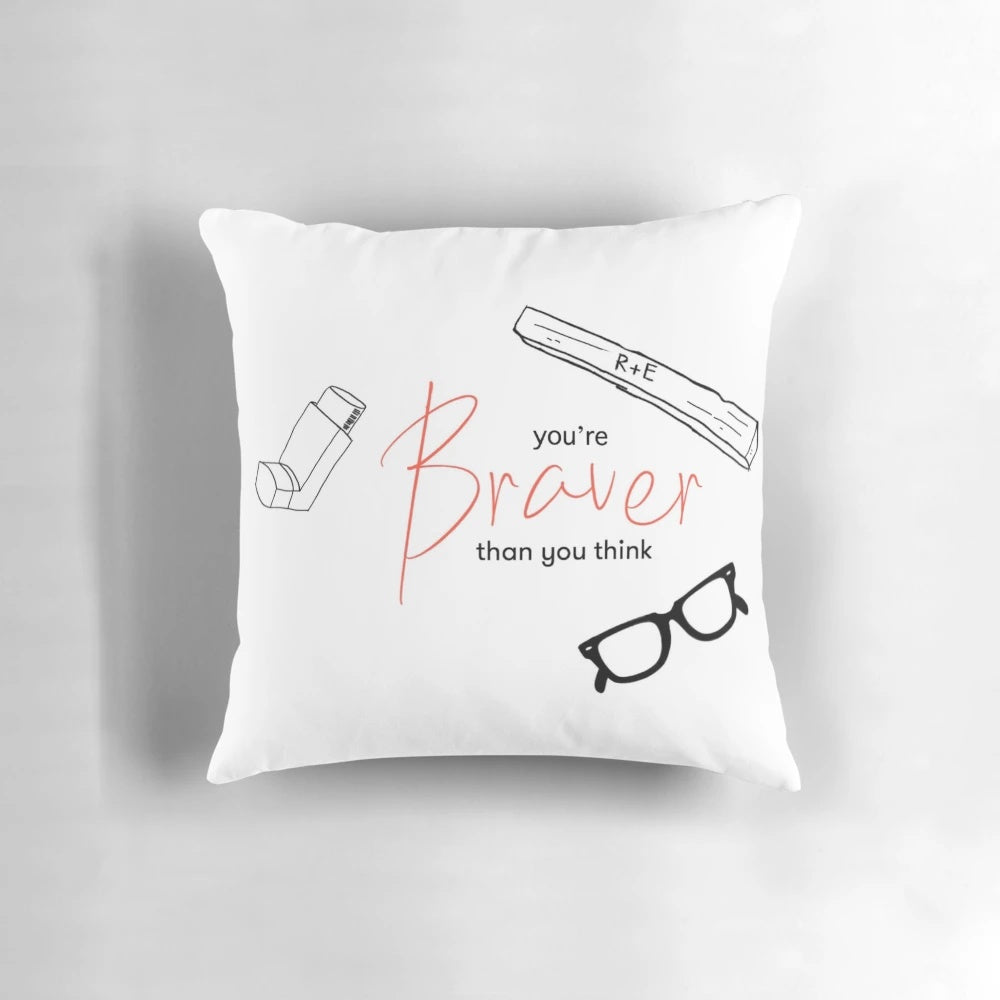Reddie pillow with the quote "You're braver than you think