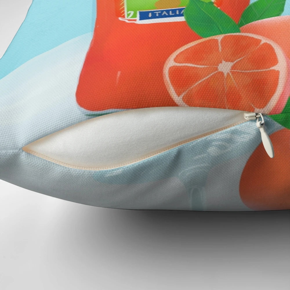 Decorative pillow featuring a vibrant illustration of an Aperol spritz cocktail, with orange slices and ice