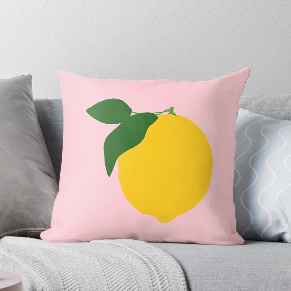 Pink lemonade-inspired decorative throw pillow with lemon and floral design