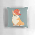 Pembroke Welsh Corgi wearing a regal crown and hat on a decorative pillow