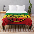 Reggae-inspired rasta plush blanket with vibrant rastafarian flag colors
