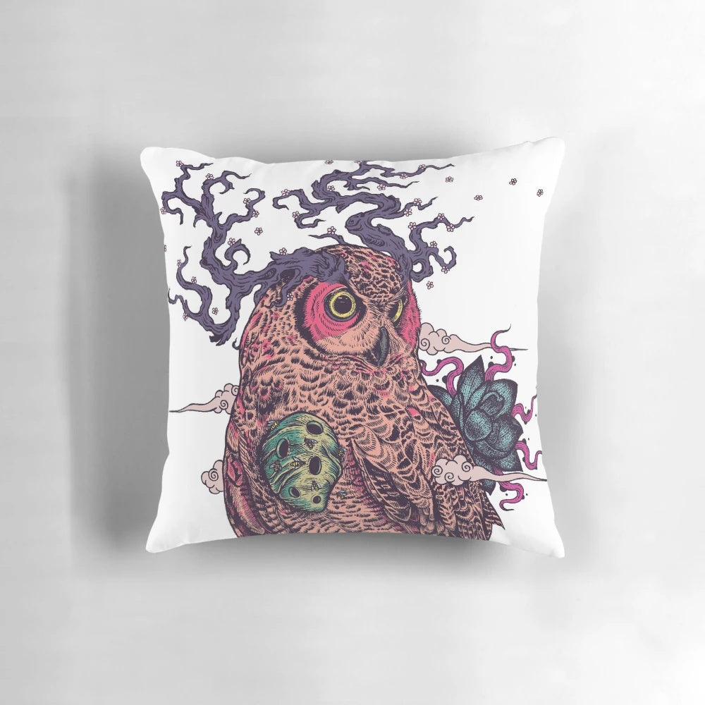 Regrowth Pillow featuring a surreal image of a great horned owl, snake, and lotus flower symbolizing the cycles of life and nature.