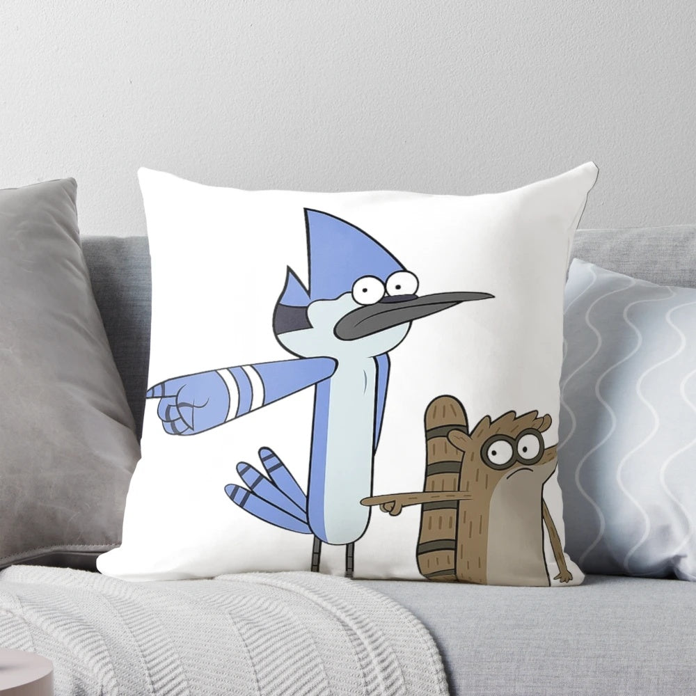 Mordecai and Rigby, the iconic cartoon characters from Regular Show, pointing on a cozy pillow