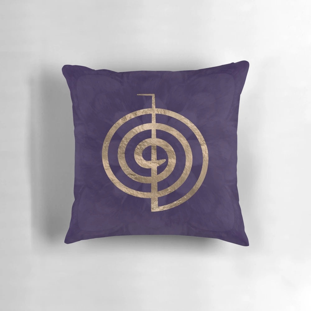 Pillow featuring the Reiki symbol Cho Ku Rei on a purple lotus design