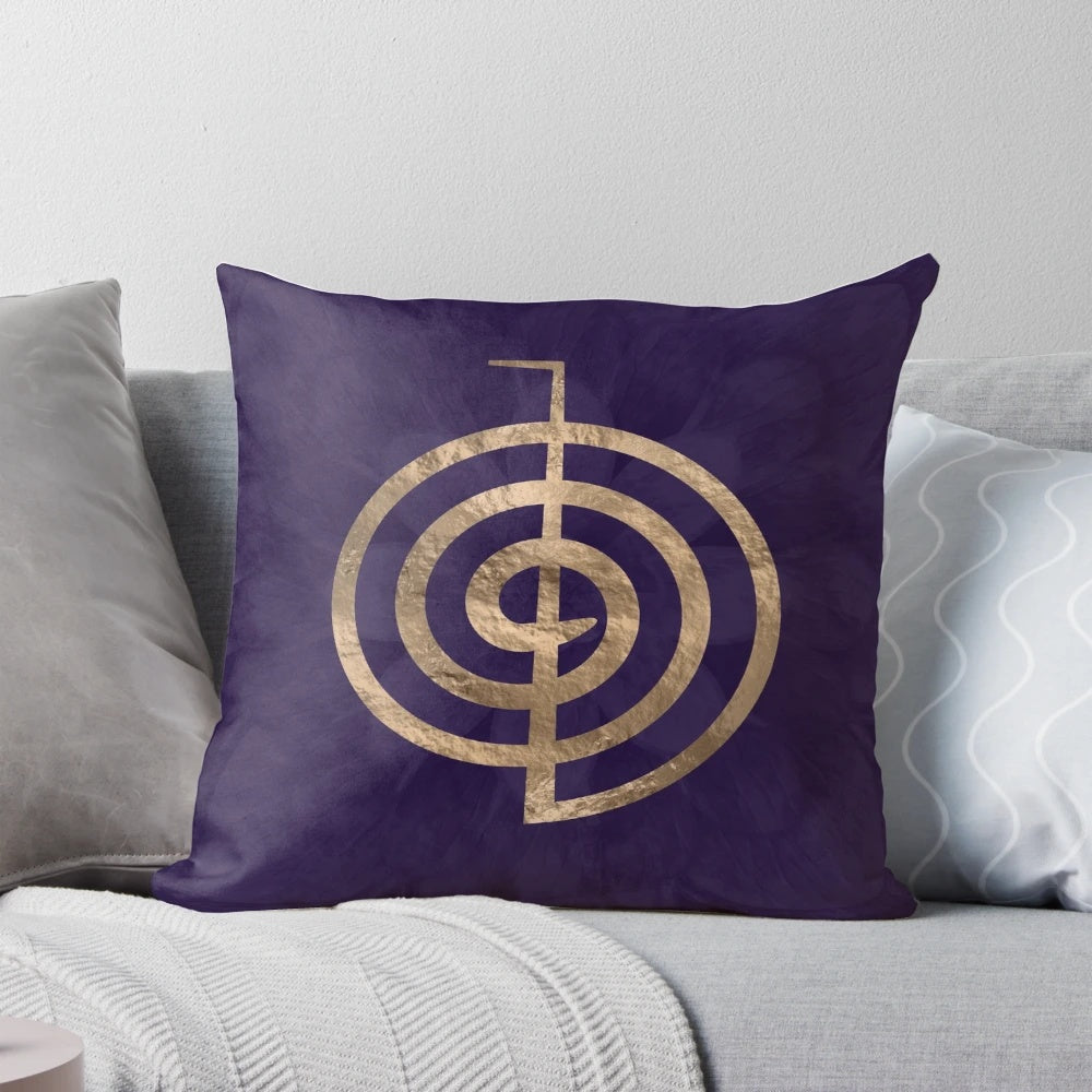 Pillow featuring the Reiki symbol Cho Ku Rei on a purple lotus design
