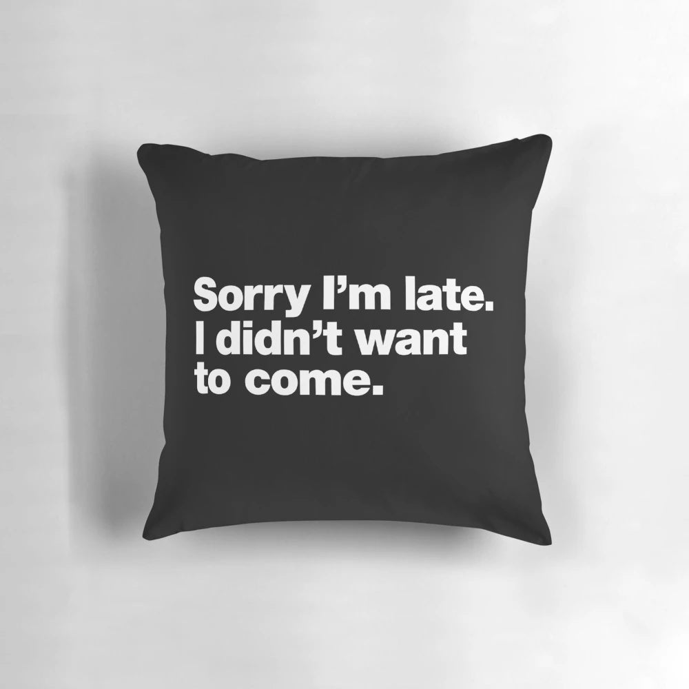 Soft, cozy pillow with the text "Sorry I'm Late, I Didn't Want to Come" printed on it, perfect for introverts and those who struggle with anxiety.