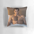 Henry Cavill, the popular Hollywood actor, relaxing on a soft, cozy pillow.