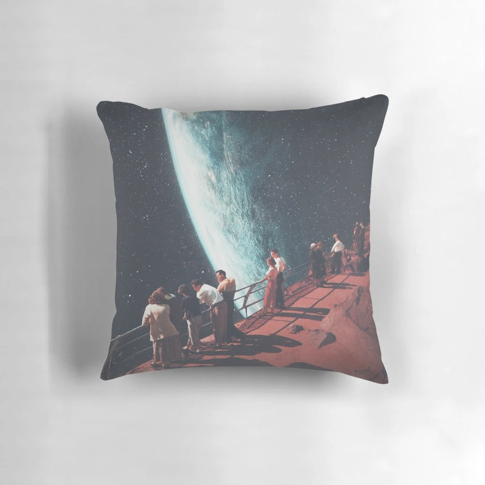 A pillow featuring a collage of space-themed imagery and a sense of nostalgia, designed by artist Frank Moth.