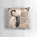 A black cat and ghost cat on a throw pillow with the text "You Matter and You Always Will"