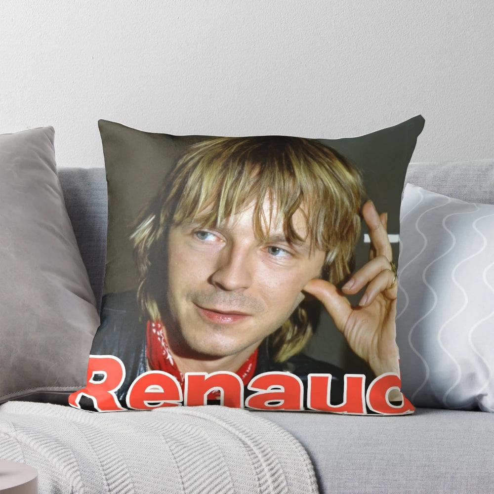 A cozy pillow featuring the image of Renaud, the renowned French singer-songwriter and music legend.