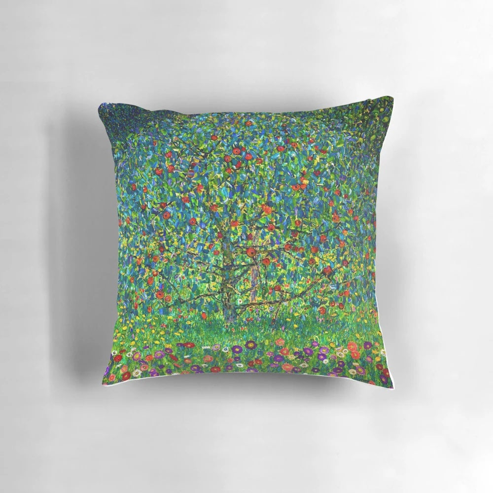 Gustav Klimt's famous "Apple Tree I" landscape painting featured on a decorative pillow