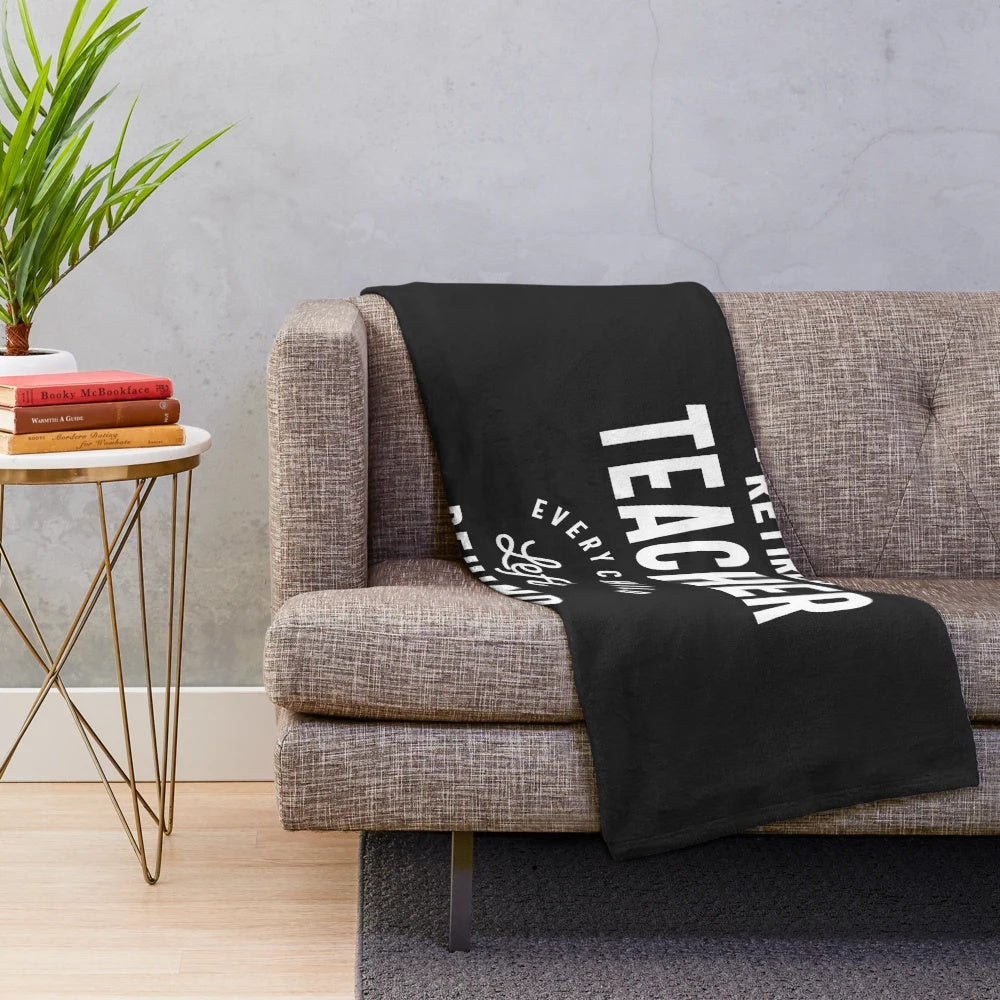 Retired teacher plush blanket with "Every Child Left Behind" text