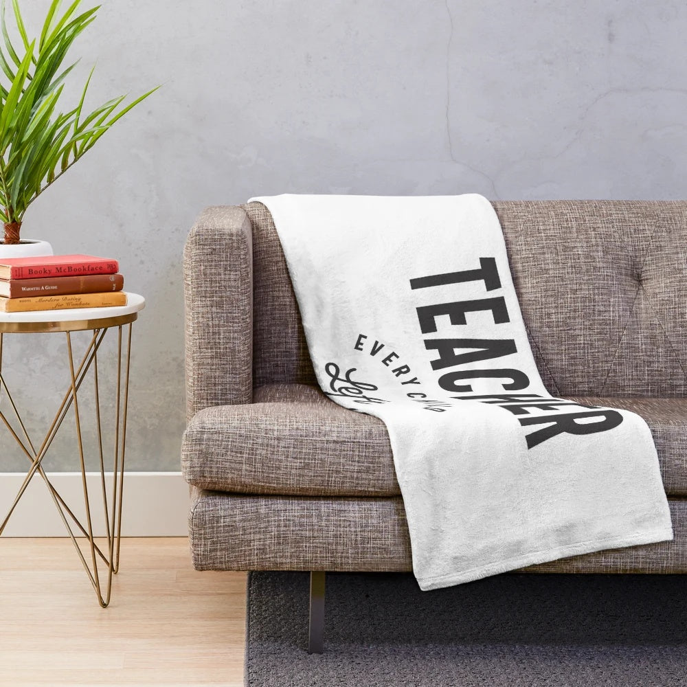 Retired teacher plush blanket with "Every Child Left Behind" text