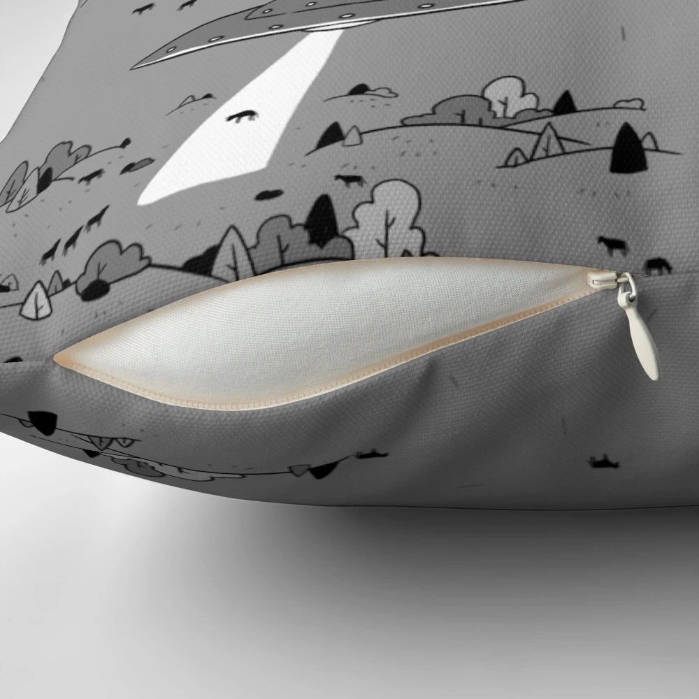 Vintage-inspired throw pillow with a UFO and alien abduction design