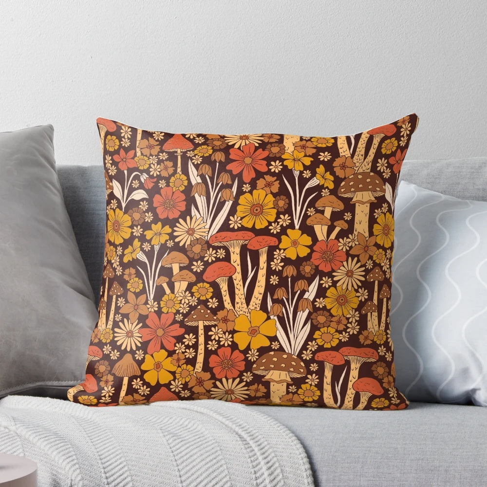 Retro 1970s-style throw pillow featuring mushrooms and flowers in brown, orange, and floral patterns