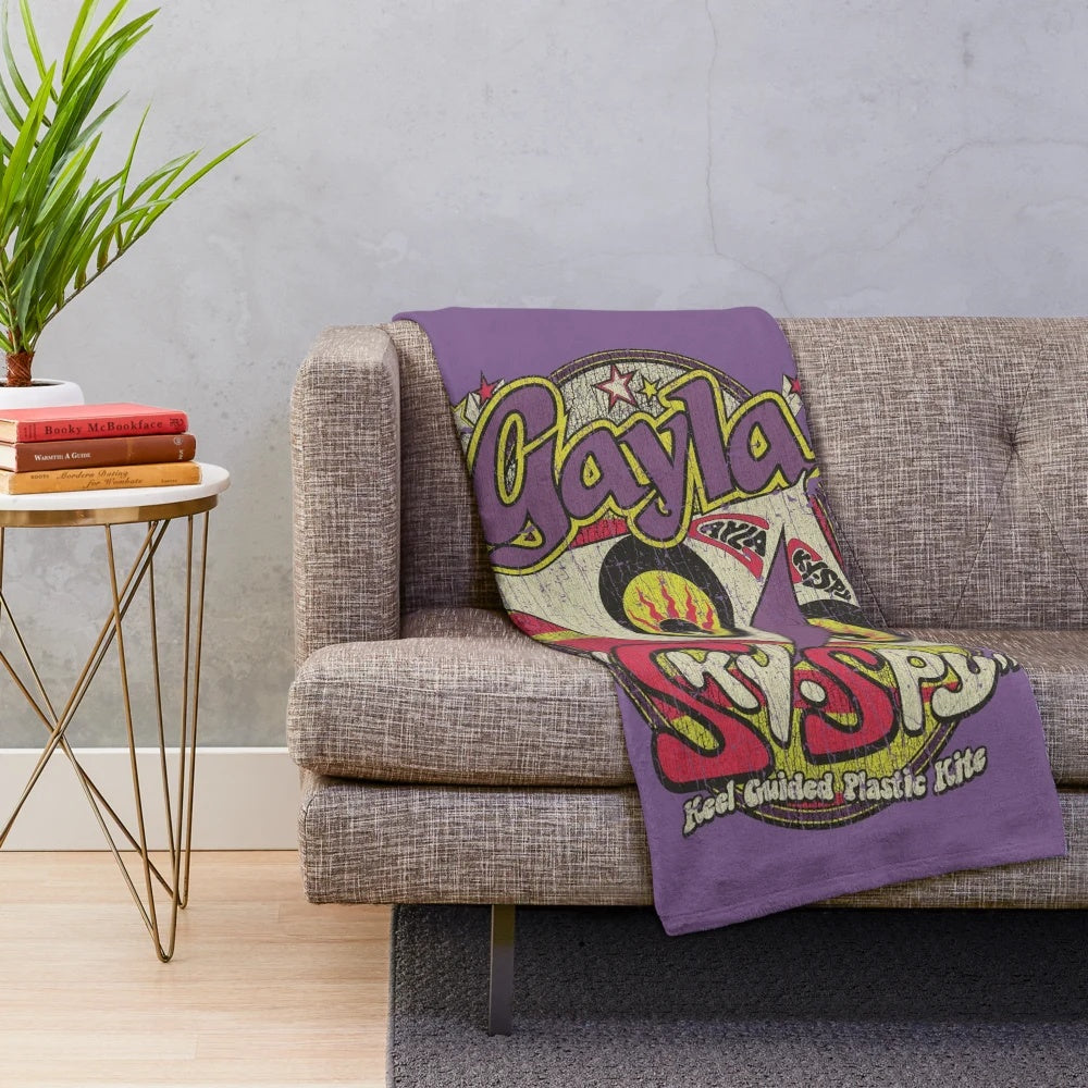 Retro 1970s style plush blanket featuring an aircraft design for aviation enthusiasts