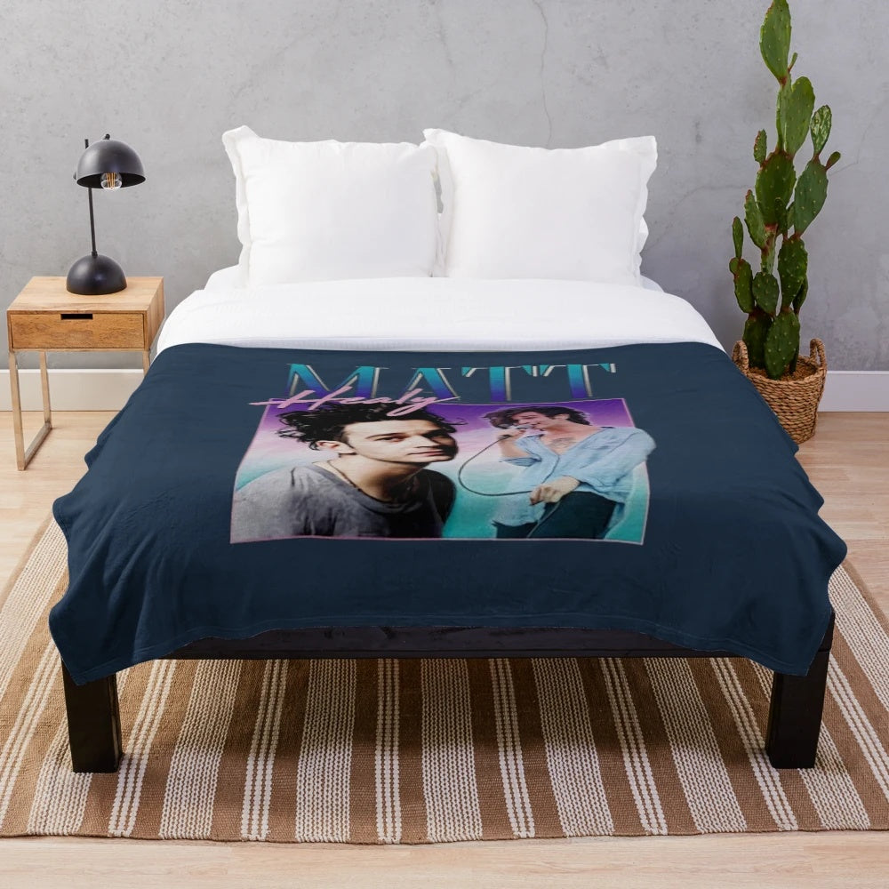 Soft plush blanket featuring a retro homage design to Matty Healy and the band The 1975