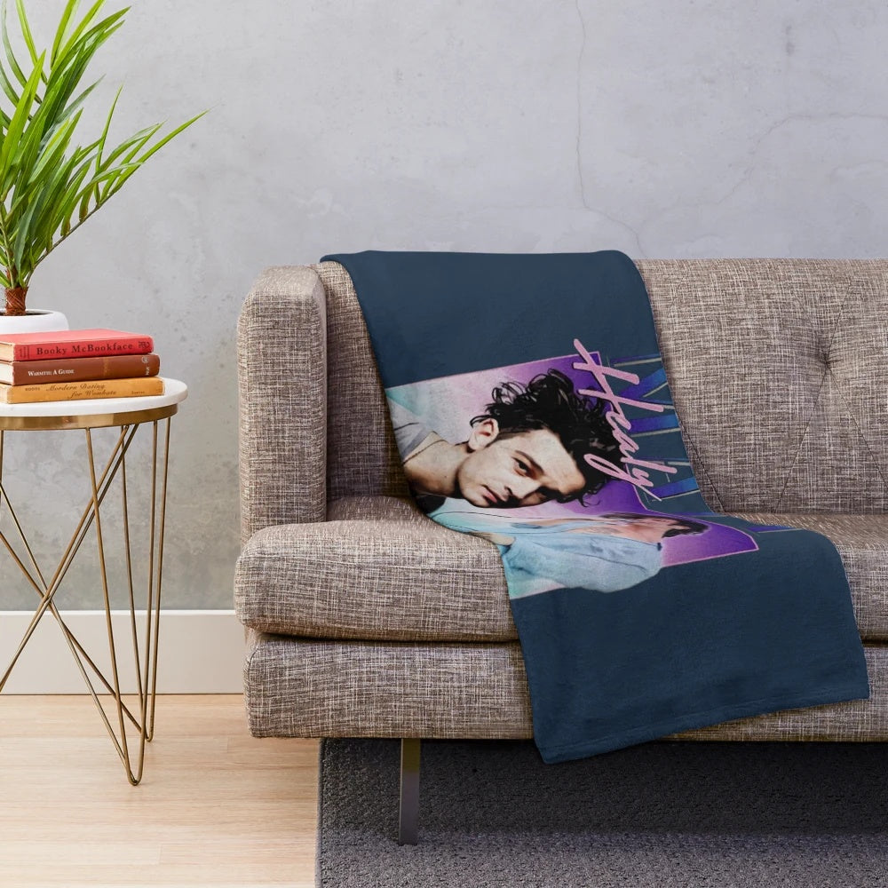Soft plush blanket featuring a retro homage design to Matty Healy and the band The 1975