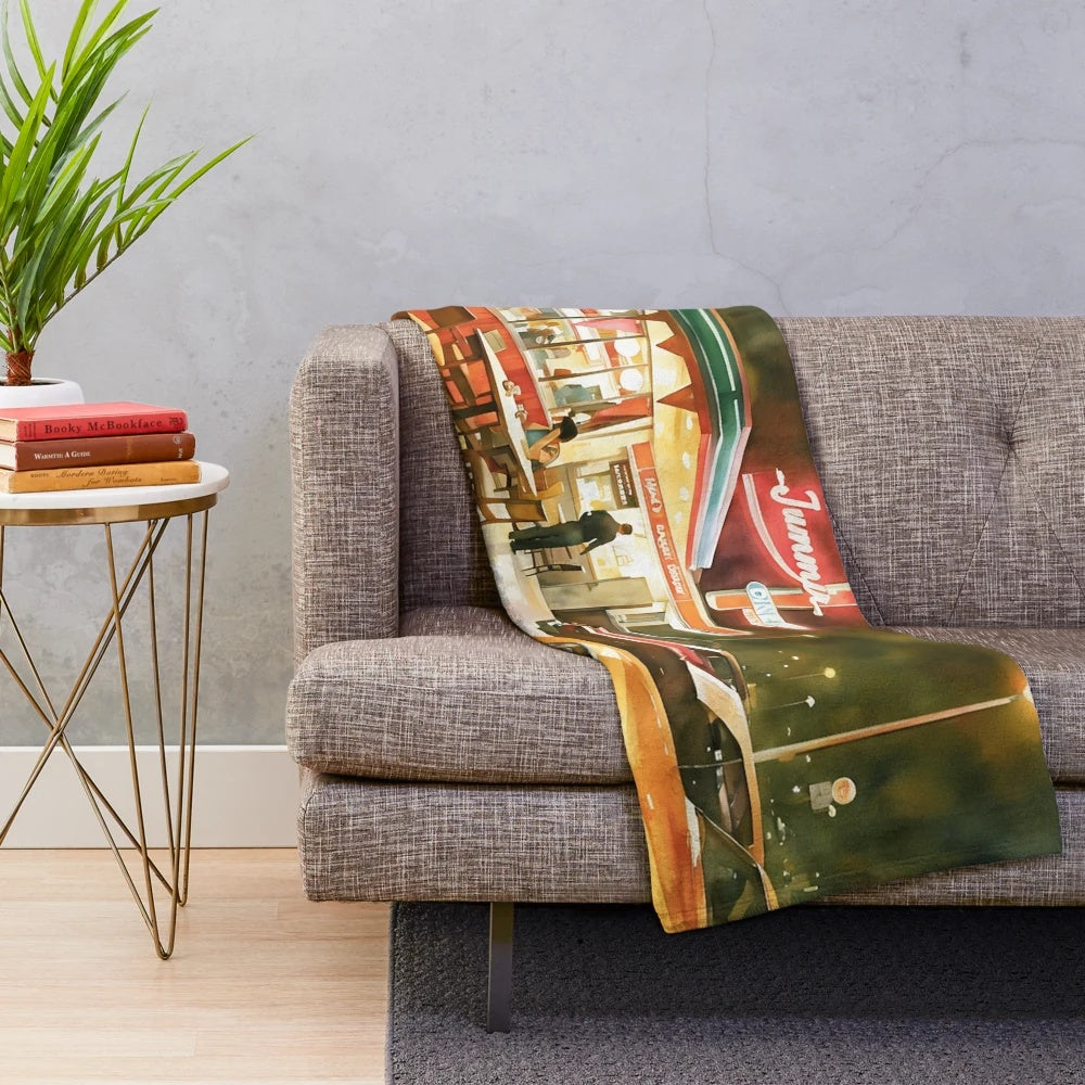 Retro 1980s diner-inspired plush blanket with neon lights and urban cityscape