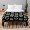 Retro 1980s monster plush blanket with vibrant monster artwork