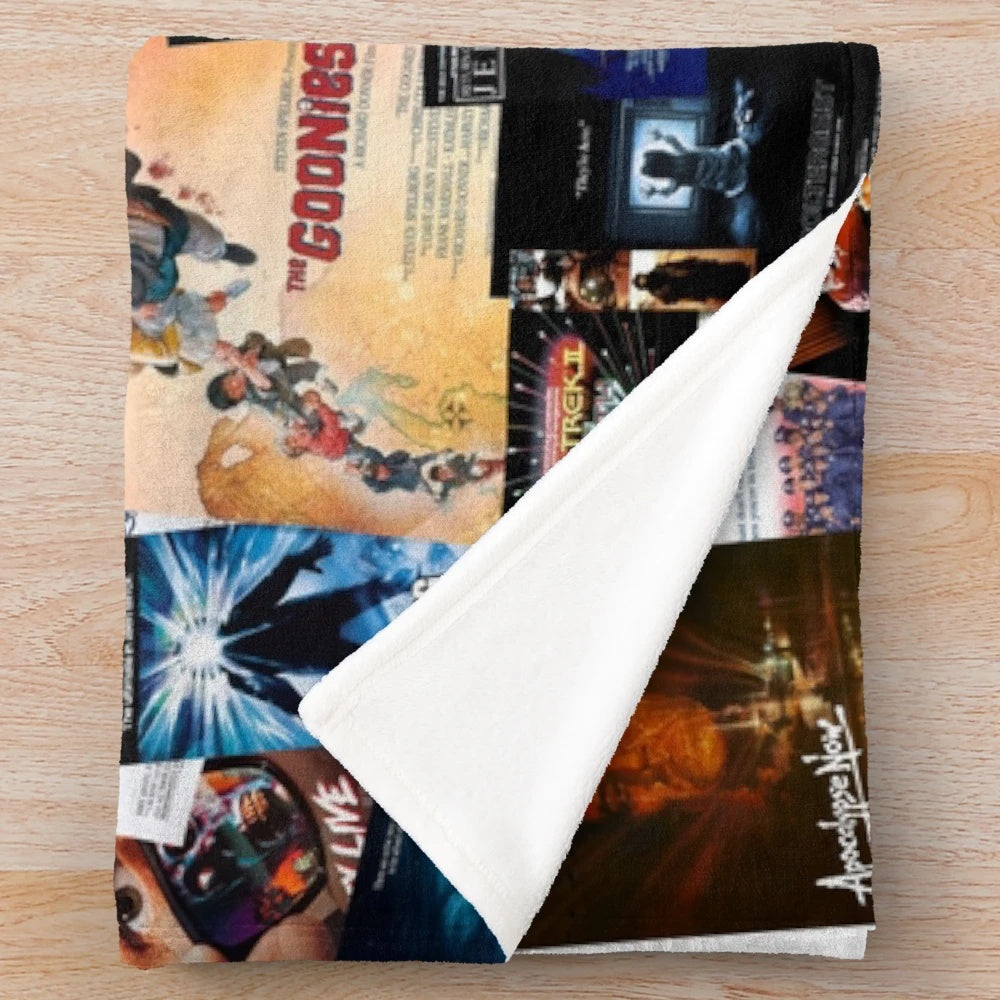 Soft and cozy plush blanket featuring vibrant 1980s movie poster designs