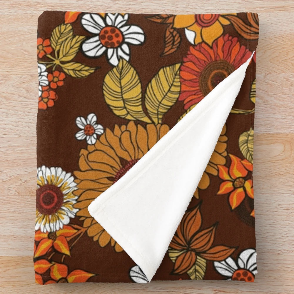 Retro 70s inspired floral plush blanket with boho, hippie flower power design