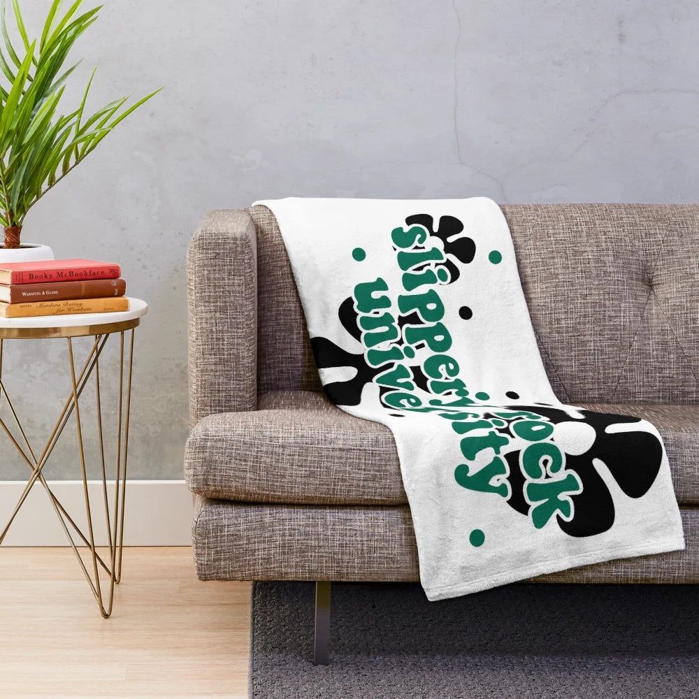 Retro 70s style plush blanket with Slippery Rock University inspired design