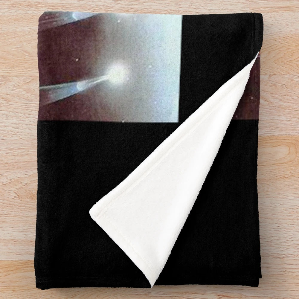 Soft and cozy plush blanket featuring a 70s rock band design