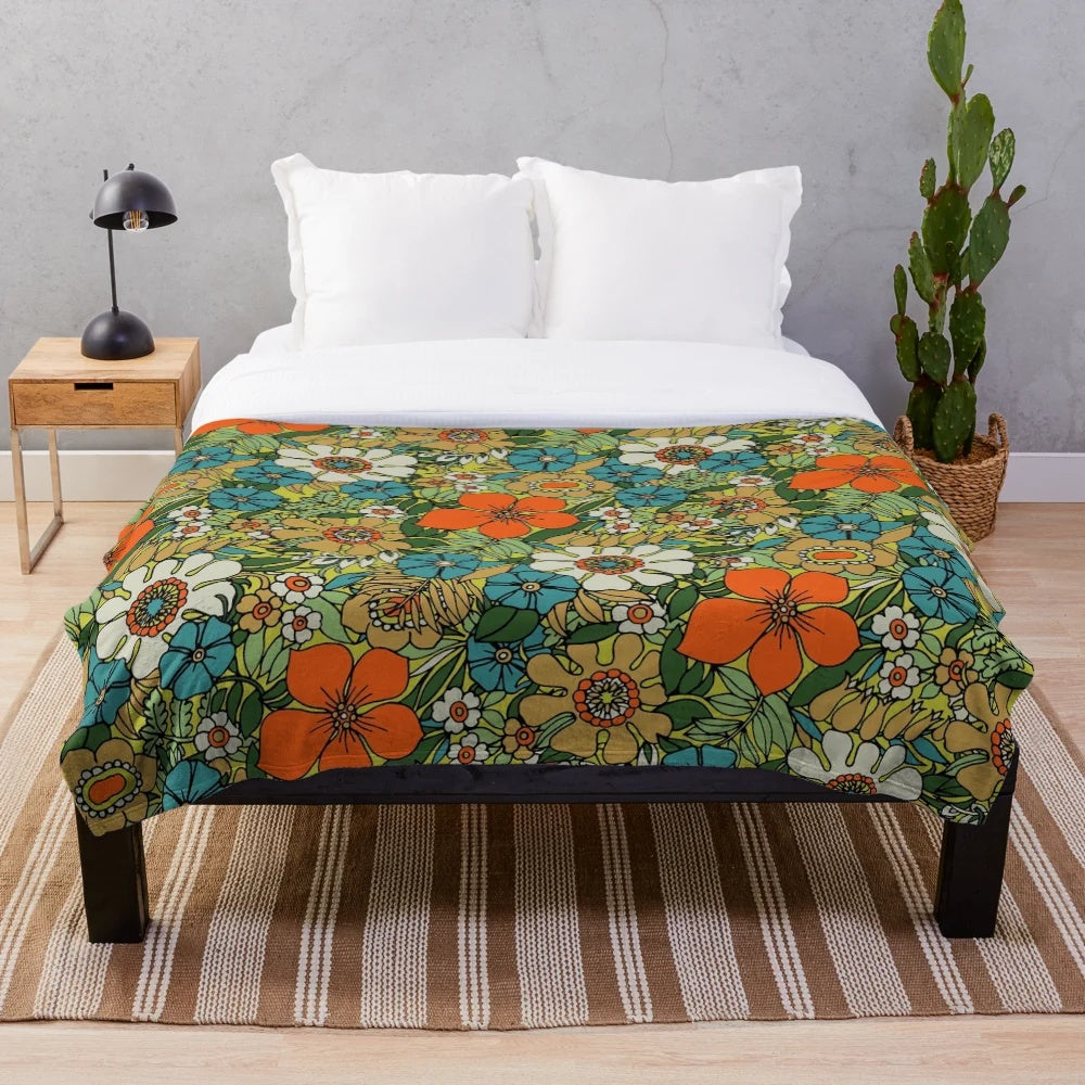 Vibrant and retro 70s style plush floral blanket