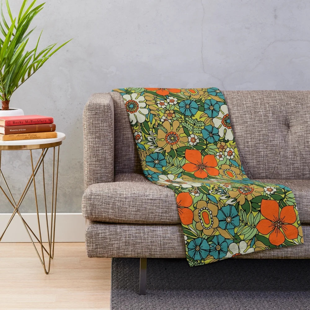 Vibrant and retro 70s style plush floral blanket