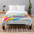 Vintage 80s cassette tape plush blanket with vibrant, colorful design