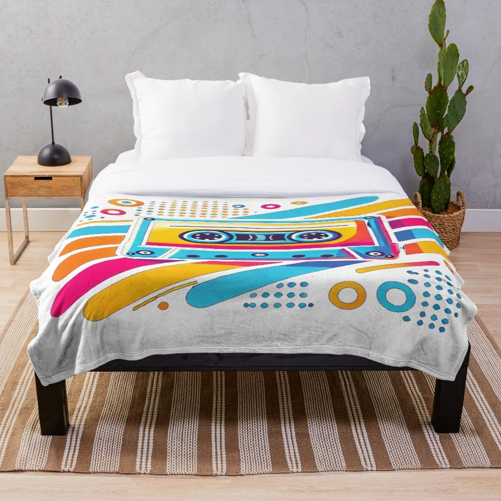 Vintage 80s cassette tape plush blanket with vibrant, colorful design