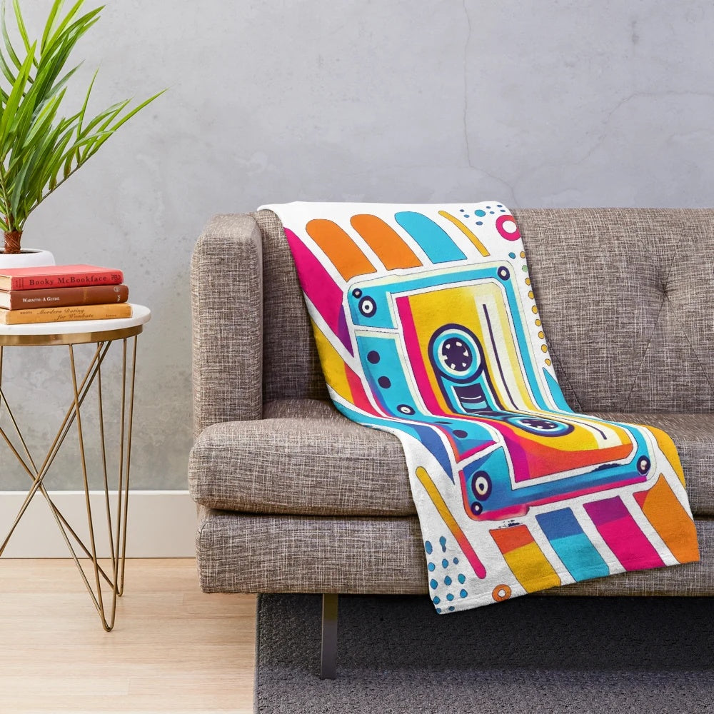 Vintage 80s cassette tape plush blanket with vibrant, colorful design