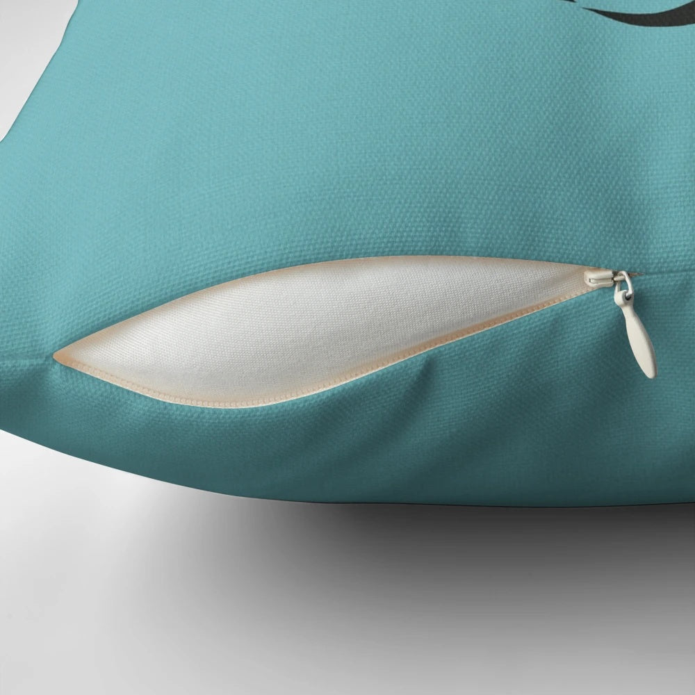 A blue and teal retro 80s cassette tape shaped pillow, a nostalgic home accessory for music lovers.