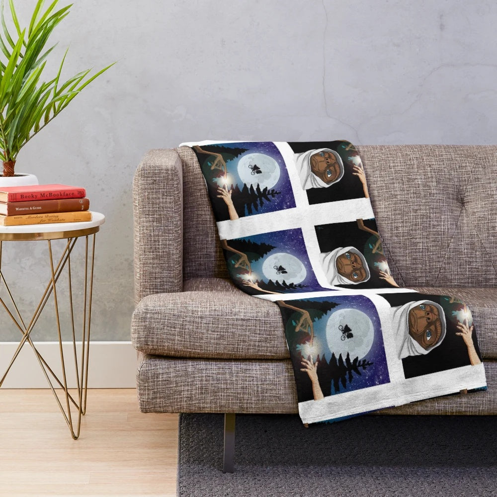 Plush blanket featuring the iconic E.T. the Extra-Terrestrial movie character