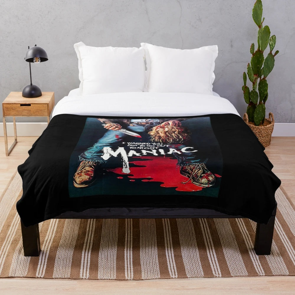 Maniac plush blanket with 80s horror movie design