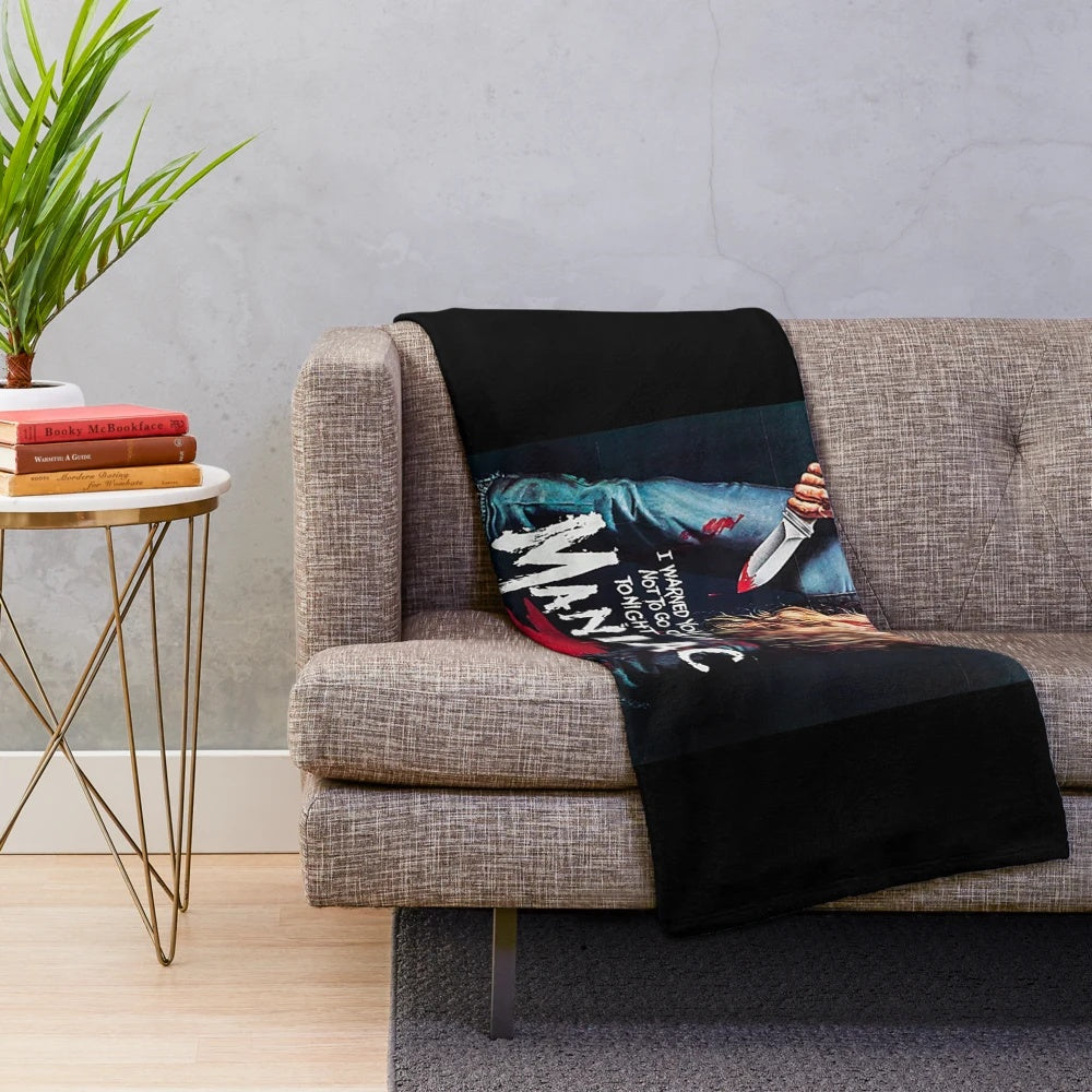 Maniac plush blanket with 80s horror movie design