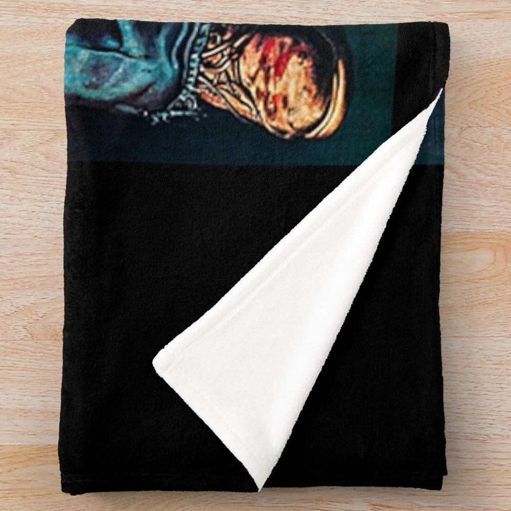 Maniac plush blanket with 80s horror movie design