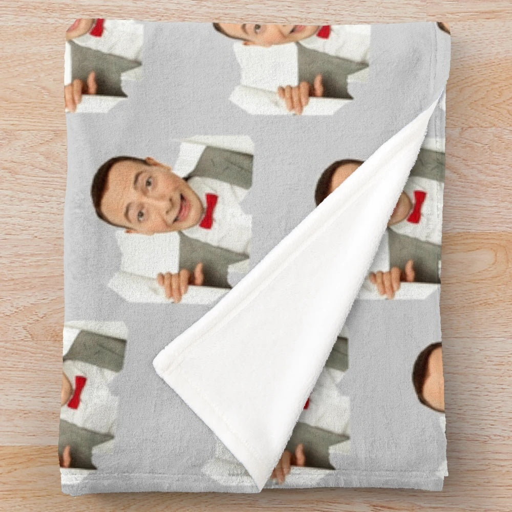 Plush blanket featuring the iconic character Pee Wee Herman from the 80s