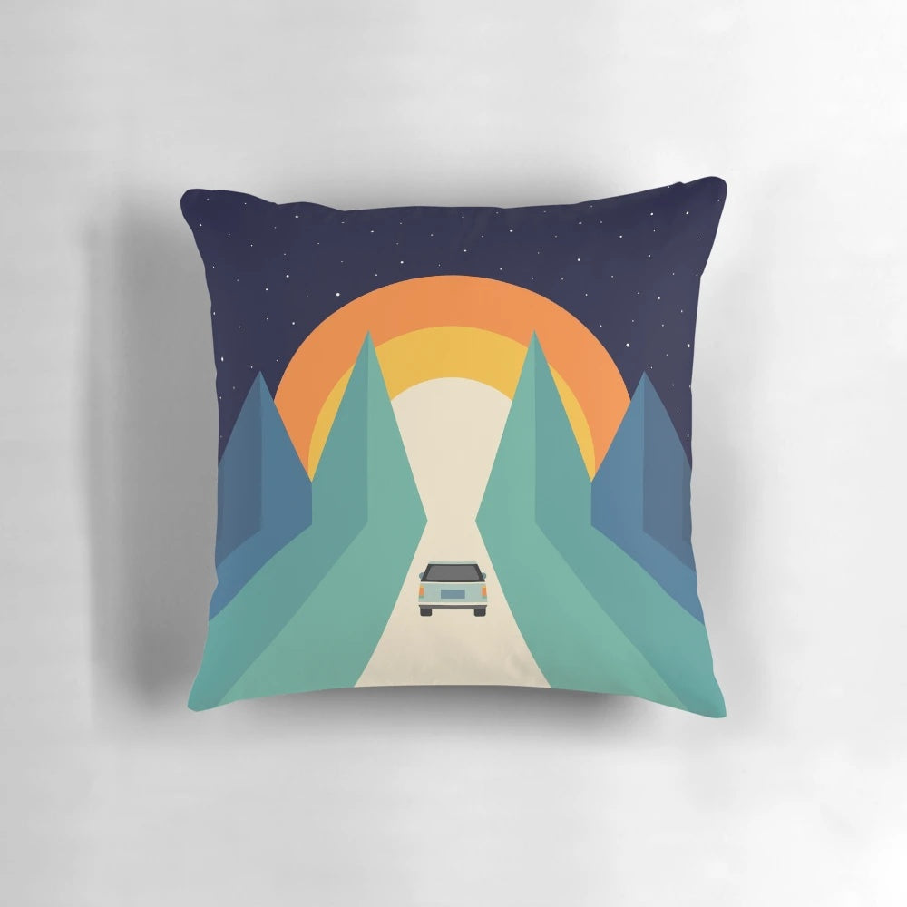 Retro 80s-style geometric and rainbow patterned pillow, perfect for road trips and vacations