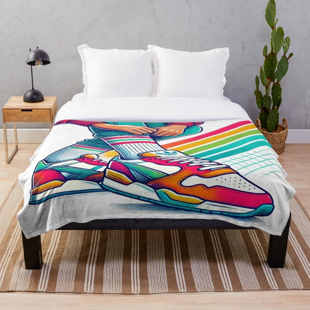 Colorful plush blanket featuring a retro 80s sneaker design