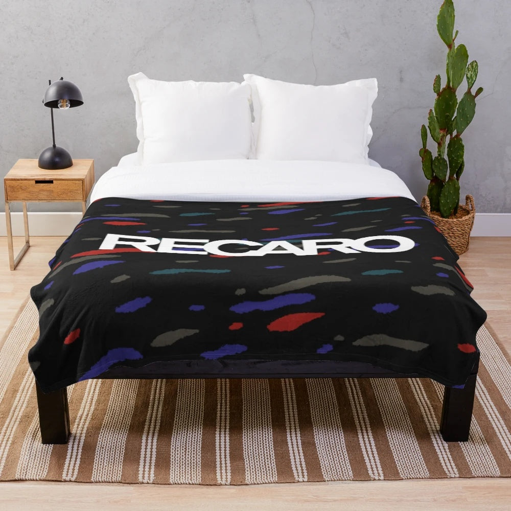 Plush blanket with a colorful confetti pattern inspired by classic JDM car upholstery