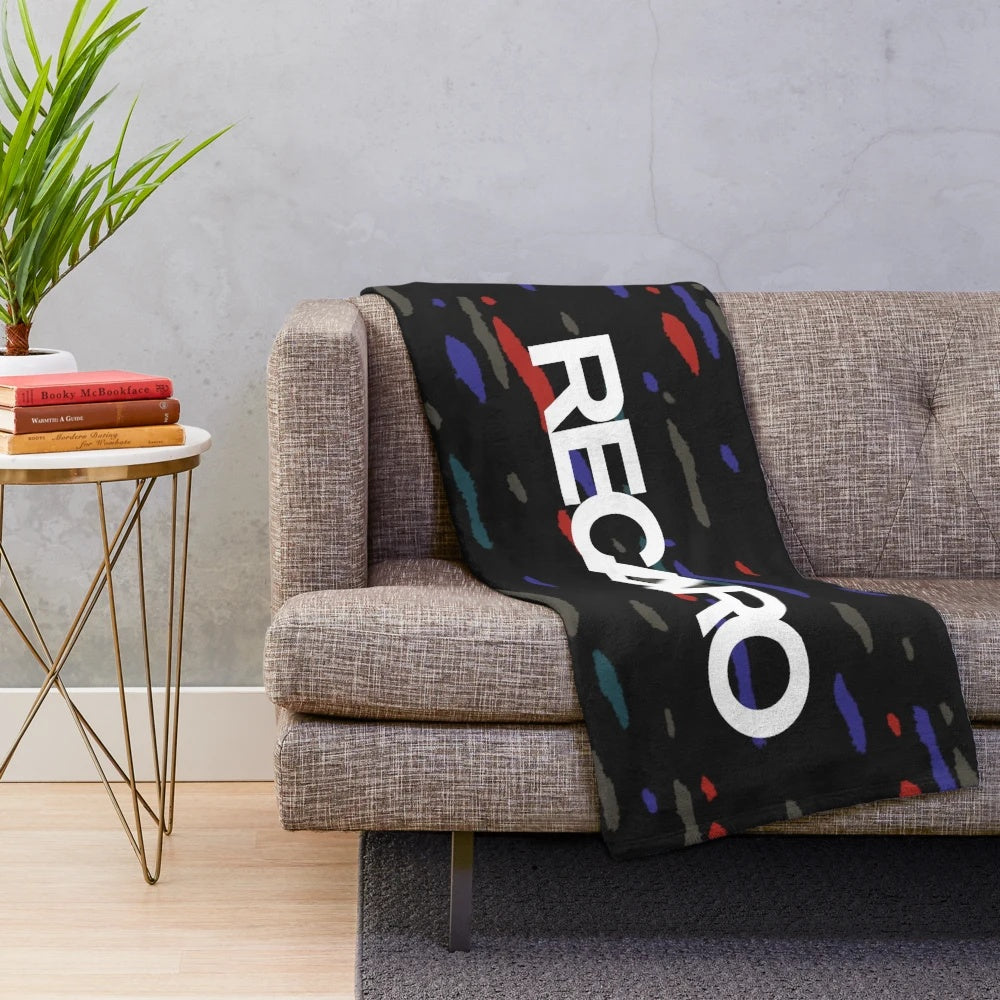 Plush blanket with a colorful confetti pattern inspired by classic JDM car upholstery
